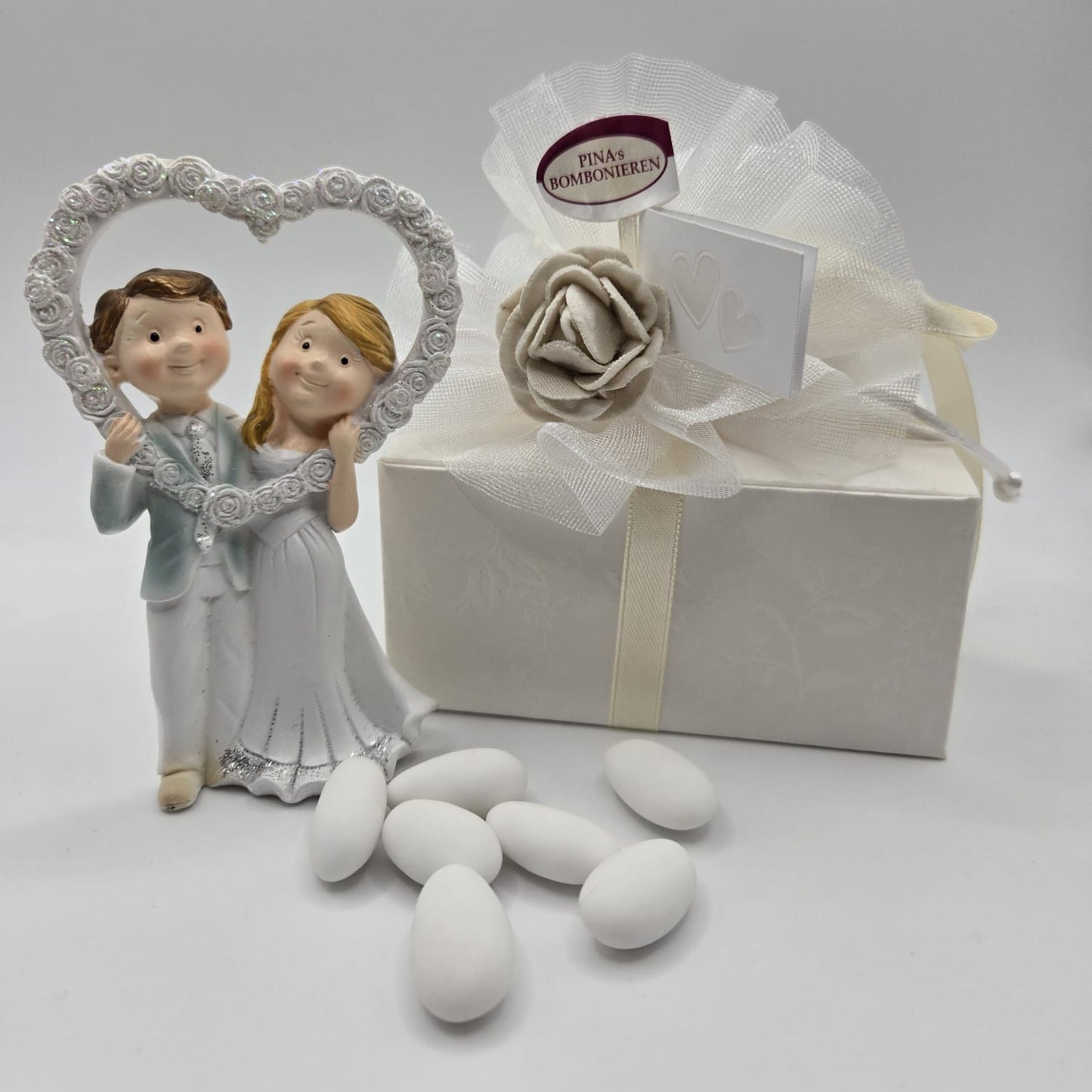 Bomboniere - Gastgeschenk Skulptur Brautpaar "Sposi" mit Herz und Glitzer